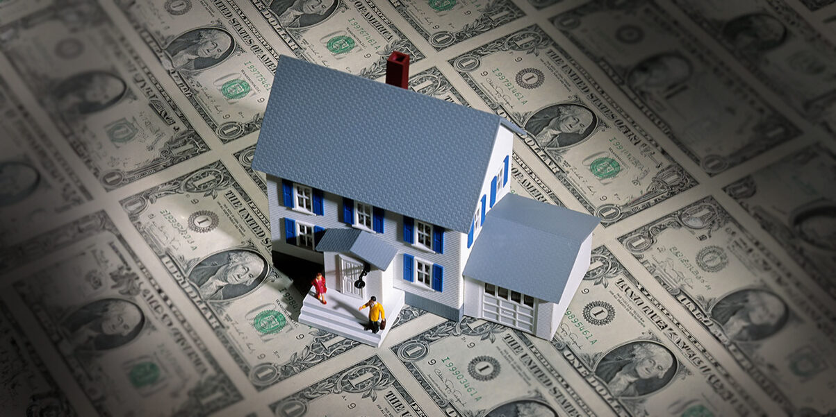Home on stack of money